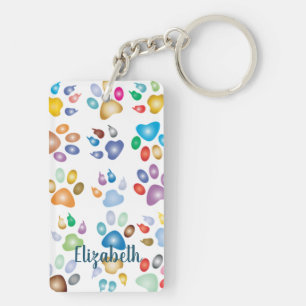 Porte-clefs Empreintes de pattes de chien colorées adorables,