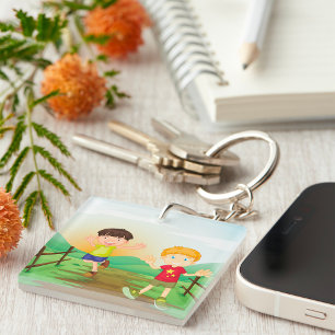 Porte-clefs Enfants heureux jouant à l'extérieur