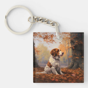 Porte-clefs Épagneul breton dans les feuilles d'automne qui to