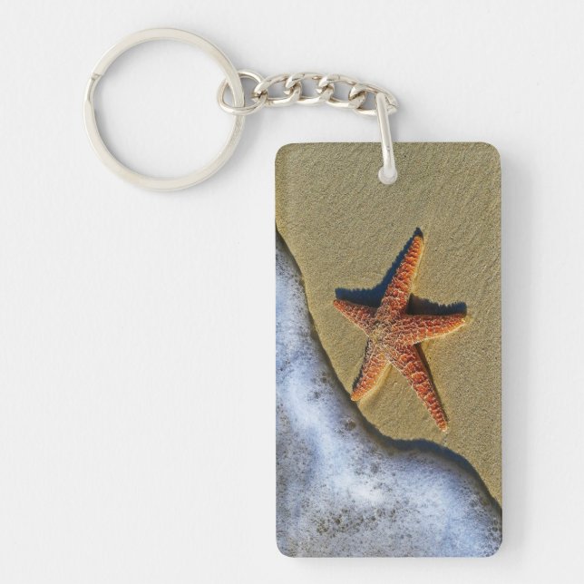 Porte-clefs Estarfish orange sur la plage (Devant)