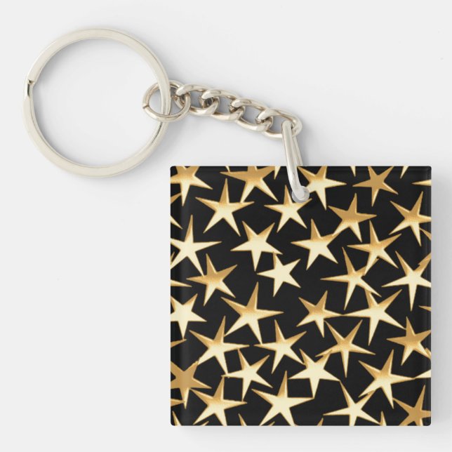 Porte-clefs étoiles d'or sur un arrière - plan noir (Devant)