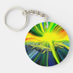 Porte-clefs Famille de dauphins sous le soleil