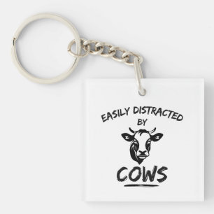 Porte-clefs Ferme de vaches : facilement distrait par les vach