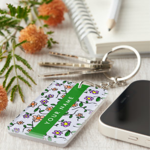 Porte-clefs Fleurs colorées, fond bleu, vert