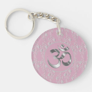 Porte-clefs Fleurs d'argent sur le symbole OM rose