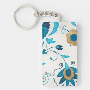 Porte-clefs Fleurs dorées d'indigo avec l'arrière - plan blanc