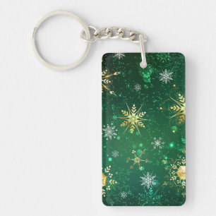 Porte-clefs Flocons de neige dorés de Noël sur fond vert