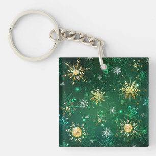 Porte-clefs Flocons de neige dorés de Noël sur fond vert