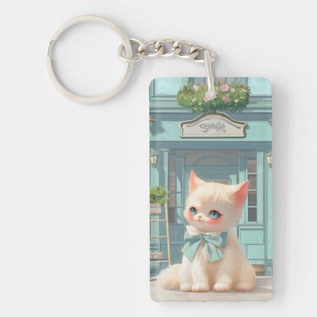 Porte-clefs Fluffy Kitten avec Blue Bow à la pâtisserie (Devant)