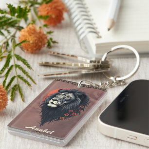 Porte-clefs Force et délicatesse unies, un lion noir