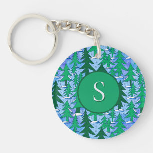 Porte-clefs Forêt de sapins hivernale d'art naïf vert bleu