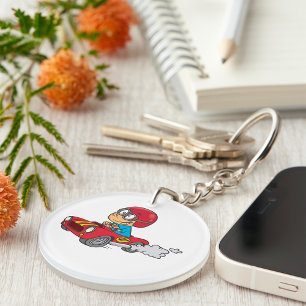 Porte-clefs Garçon conduisant voiture rouge course