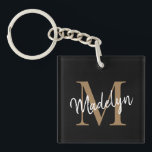 Porte-clefs Girl Black Gold Monogramme Nom Élégant Script chic<br><div class="desc">Girly Black Gold Monogramme Nom Elegant Chic Script Porte - clé. Personnalisez facilement ce porte - clé élégant moderne avec votre monogramme et votre nom personnalisés.</div>