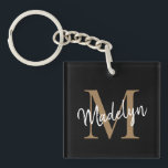 Porte-clefs Girl Black Gold Monogramme Nom Élégant Script chic<br><div class="desc">Girly Black Gold Monogramme Nom Elegant Chic Script Porte - clé. Personnalisez facilement ce porte - clé élégant moderne avec votre monogramme et votre nom personnalisés.</div>