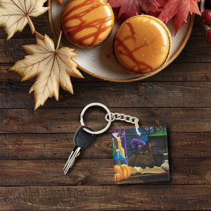 Porte-clefs Halloween sorcière chat violet magie
