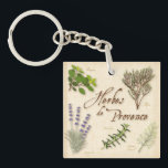 Porte-clefs Herbes de Provence Porte - clé<br><div class="desc">Personnalisez avec votre texte personnalisé. Herbes de Provence, un mélange populaire d'herbes aromatiques du sud-ouest de la France utilisé par les chefs pour savourer viandes, poissons, soupes, ragoûts et légumes. Combiner les herbes séchées entières : 2 c. à s. Feuilles De thym 1 C. À S. Oregano feuilles 1 C....</div>