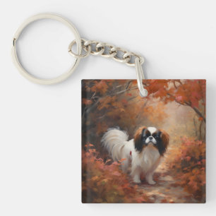 Porte-clefs Japanese Chin dans les feuilles d'automne tombent 