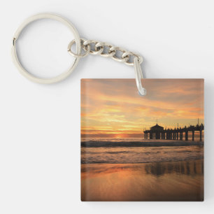 Porte-clefs Jetée sur le coucher de soleil de la plage océaniq