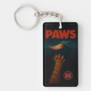 Porte-clefs Joli chat tigré orange contre pied humain