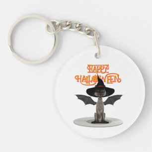 Porte-clefs Joyeux Halloween. Chat avec ailes et casquette de