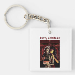 Porte-clefs Joyeux Noël. Squelette drôle avec femme
