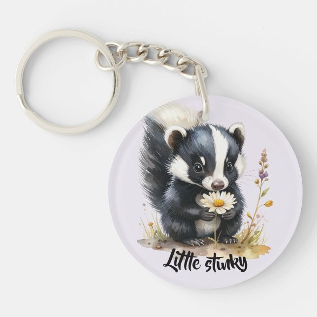 Porte-clefs Kleines Stinktier schnüffelt an Gänseblümchen  (Devant)