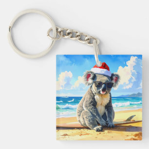 Porte-clefs Koala au chapeau de Santa soleil et surf
