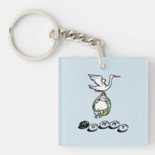 Porte-clefs La cigogne porte un bébé garçon