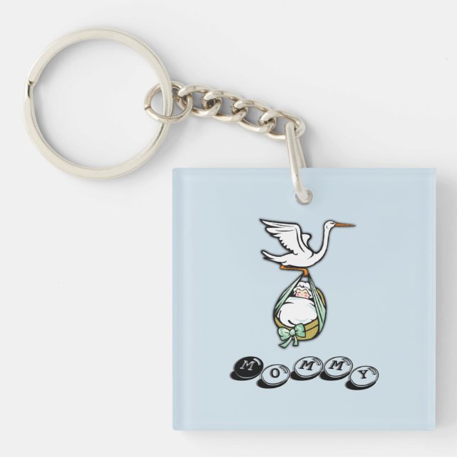 Porte-clefs La cigogne porte un bébé garçon (Devant)