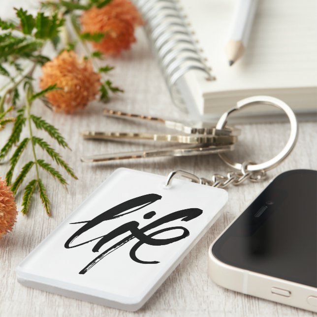 Porte-clefs La vie en noir brossé (Devant droit)