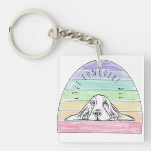 Porte-clefs l'amour conquiert tout chien arc-en-ciel basset ho