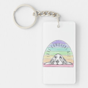 Porte-clefs l'amour conquiert tout chien arc-en-ciel basset ho