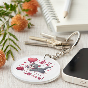 Porte-clefs L'amour est une poursuite qui vaut la peine de cha
