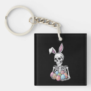 Porte-clefs Lapin squelette tenant des œufs de Pâques Lapin dr