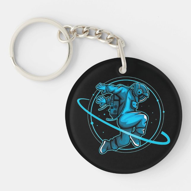 Porte-clefs L'astronaute Saute En Dansant Autour De Saturne | (Devant)