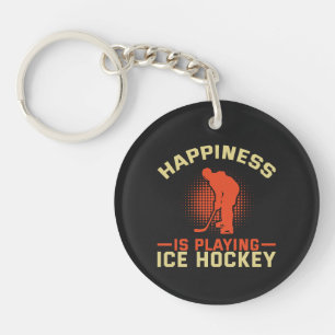 Porte-clefs Le bonheur joue au hockey sur glace