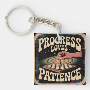 Porte-clefs Le progrès aime la patience