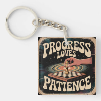 Porte-clefs Le progrès aime la patience