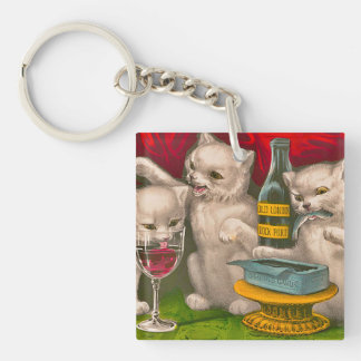 Porte-clefs Les chatons boivent et mangent du poisson sardine