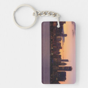 Porte-clefs Les ensembles du soleil au-dessus de l'horizon de
