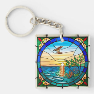 Porte-clefs Lever de soleil sur l'océan avec oiseau en vol