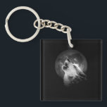 Porte-clefs Loup et lune de Howling noir et blanc<br><div class="desc">Un loup est encore un loup, même lorsqu'il est seul. Peut-être qu'un loup est encore plus un loup lorsqu'il est seul.</div>