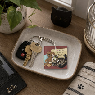Porte-clefs Maison de chat tabby fantaisiste bordeaux cosy