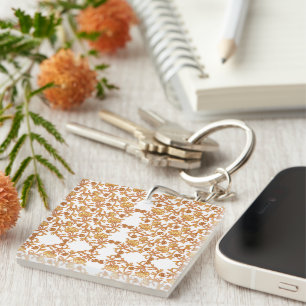 Porte-clefs Modèle floral symétrique avec motif orange