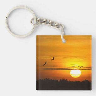 Porte-clefs Moments romantiques Grues au lever du soleil photo