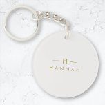 Porte-clefs Monogram or gray | Minimaliste Elegant Moderne<br><div class="desc">A simple stylish custom monogram design in a gold minimalable typographiy on an elegant minimum taupe gray background. The monogram initials and name can easily be personalized along with the feature line to make a design as unique as you are! Le parfait poison de l'accessoire pour un instant.</div>