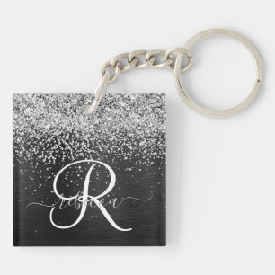 Porte-clefs Monogramme à étincelle noire à Parties scintillant