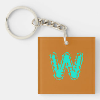 Porte-clefs Monogramme déplaisant vert toxique sur orange