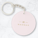 Porte-clefs Monogramme Elegant Minimal Blush rose et or<br><div class="desc">A simple stylish custom monogram design in a gold minimalist typographiy on an elegant pastel blush pink background. The monogram initials and name can easily be personalized along with the feature line to make a design as unique as you are! Le parfait poison de l'accessoire pour un instant.</div>