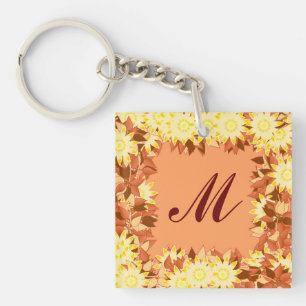 Porte-clefs Monogramme encadré de fleurs - cacao et jaune